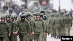 "Непрохані гості". Кримська криза на знімках світових ЗМІ. ФОТО