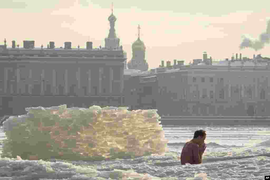 A man bathes in an ice hole in the Neva River St. Petersburg, Russia.