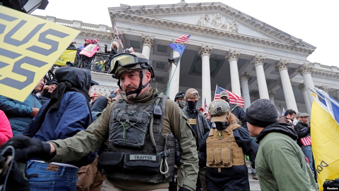 FILE - Members of the Oath Keepers are seen among supporters of U.S. President Donald Trump at the U.S. Capitol during a protest in Washington, Jan. 6, 2021.