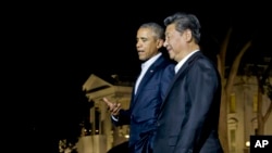 星期四，美国总统奥巴马和中国国家主席在白宫北草坪。