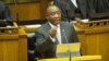 FILE - South African President Cyril Ramaphosa delivers his State of the Nation address at Parliament in Cape Town, South Africa, Feb. 7, 2019.