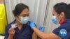 ‘A New Beginning’: Relief, Hope as Britain Begins Mass Coronavirus