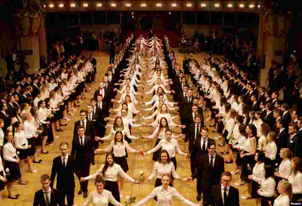 Members of the opening committee perform during a dress rehearsal a day before the traditional Opera Ball in Vienna, Austria, Feb. 7, 2018.