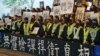 抗议声中香港中文大学毕业典礼匆匆提前结束 