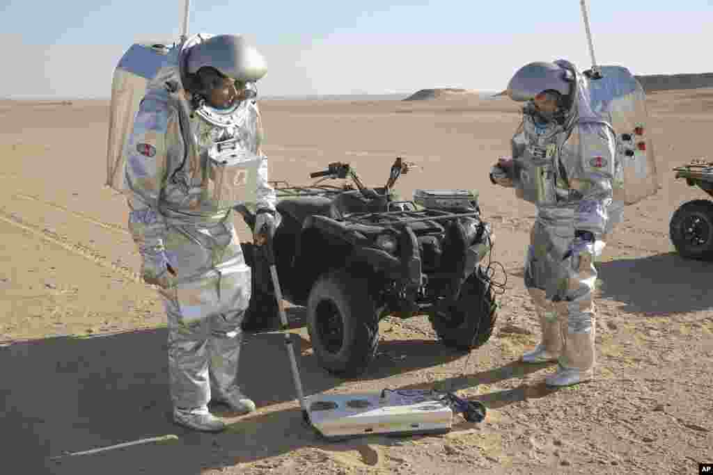 Two scientists test space suits and a geo-radar for use in a future Mars mission in the Dhofar desert of southern Oman. The desolate desert in southern Oman resembles Mars so much that more than 200 scientists from 25 nations organized by the Austrian Space Forum are using it for the next four weeks to field-test technology for a manned mission to Mars.
