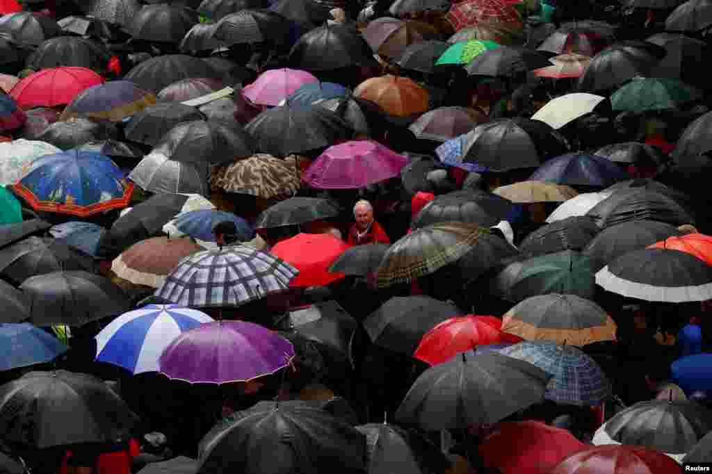 People take part in a pensioners protest in favour of higher state pensions in Madrid, Spain.