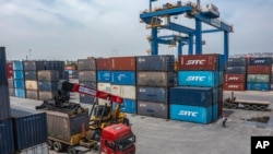 中国海关总署1月13日公布的数据显示，中国2024年12月份的出口同比增长加速，而进口有所恢复。
