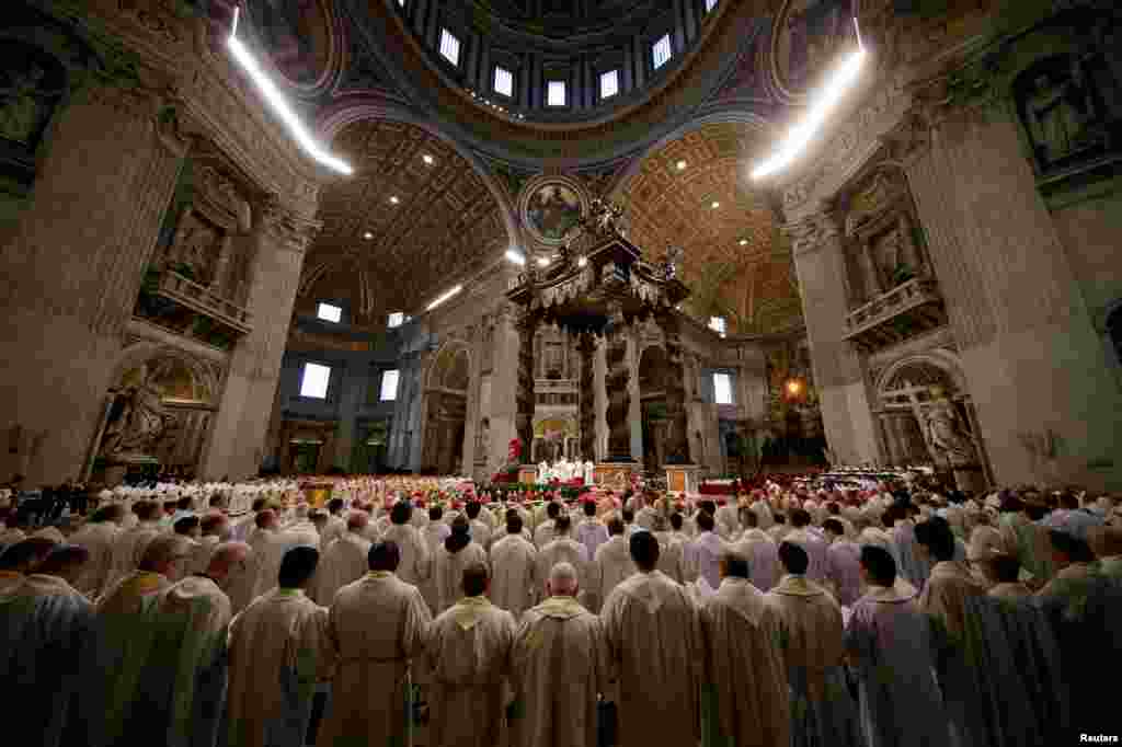 Pope Francis leads the Chrism Mass on Holy Thursday during which sacred oils are blessed at Saint Peter's Basilica at the Vatican.