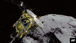 日本隼鸟二号探测器发送会地球的小行星龙宫照片