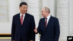 资料照：俄罗斯总统普京在莫斯科克里姆林宫会见到访的中国领导人习近平。（2023年3月21日）
