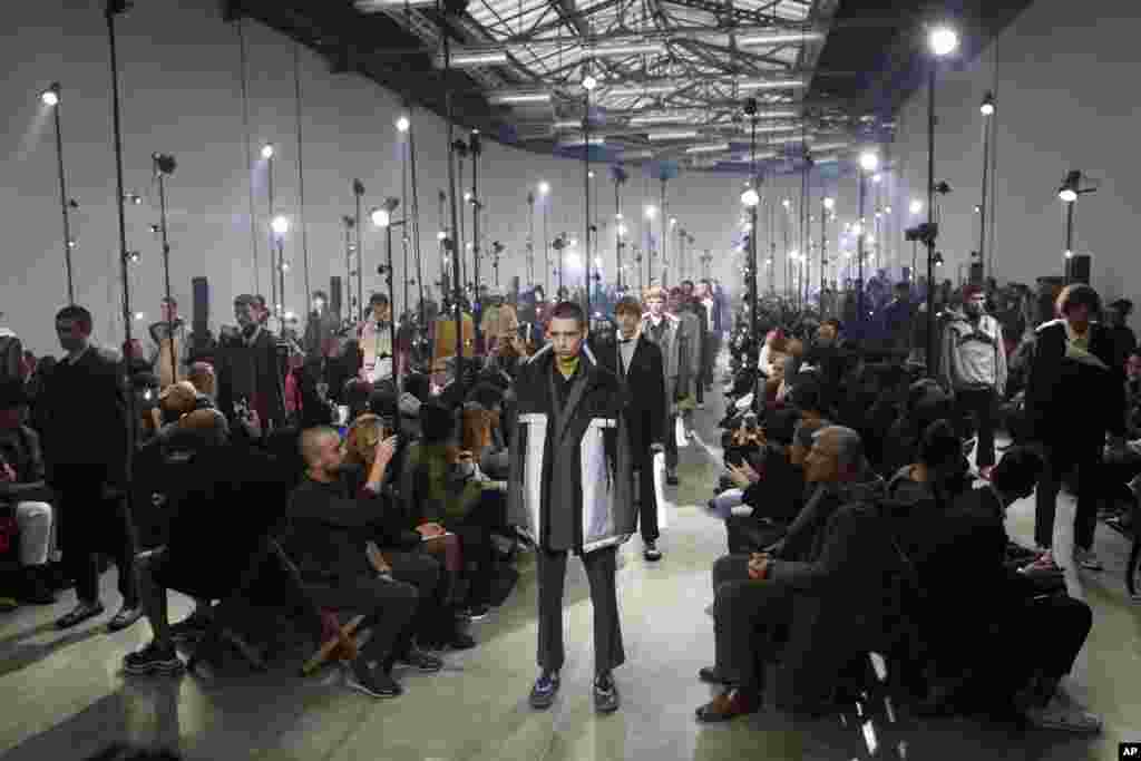 Models wear creations for the Lanvin men's Fall-Winter 2018/2019 fashion collection presented in Paris, France.