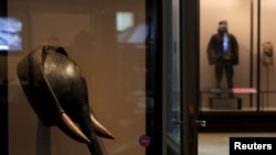 A mask called 'The Elephant Mask", dated to the 19th century, is pictured at the Royal Museum for Central Africa as the Belgian government has announced plans to return pieces of art looted from Congo during colonial rule, in Tervuren, July 6, 2021.