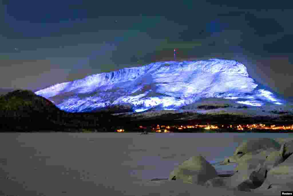 The Saana fell is lighted as part of the Luminous Finland 100 project, a light art event that will be held in honor of the 100th anniversary of Finland's independence, in Kilpisjarvi, Finland.