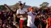 Opposition party supporters cheer opposition challenger Nelson Chamisa at a campaign rally in Bindura, Zimbabwe, July 27, 2018. 