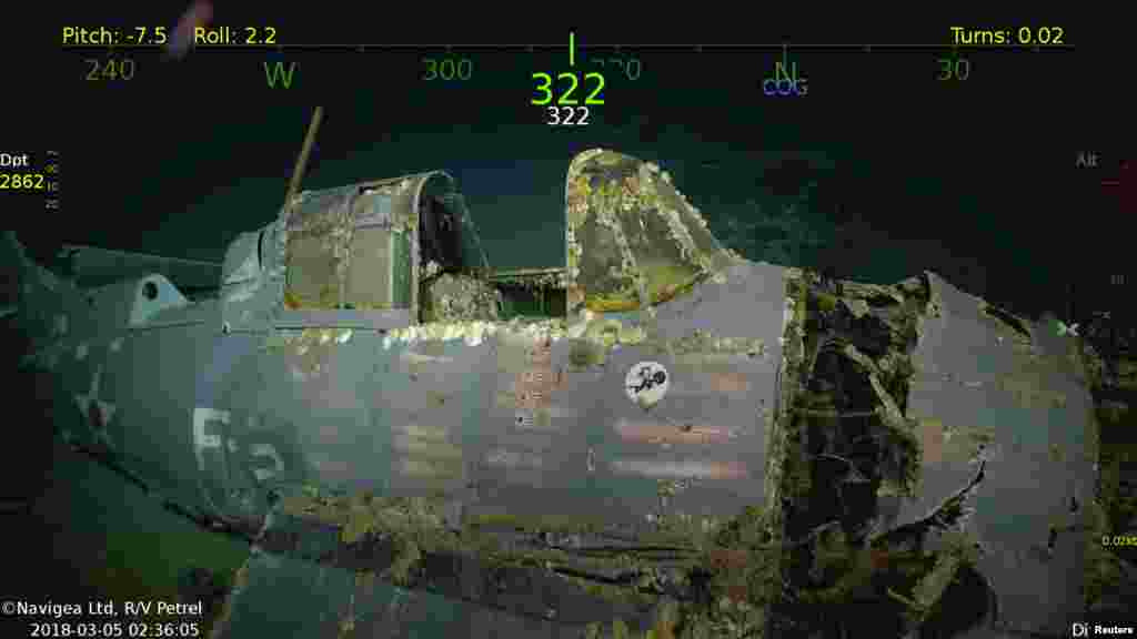 A fighter aircraft is seen in the wreckage of the sunken USS Lexington, a World War II U.S. Navy aircraft carrier. (Image courtesy: Paul G. Allen)