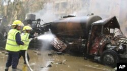Nhân viên chữa cháy Syria làm việc tại hiện trường sau vụ nổ