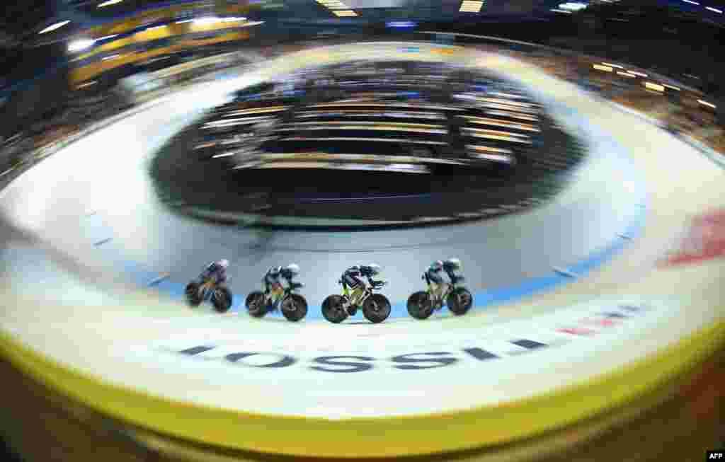 France's team competes in the Women's Team Pursuit qualifying round during the UCI Track Cycling World Championships in Apeldoorn, Netherlands.