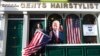 FILE - Catherine Hallahan waits for the celebrations to start in Ballina, North West of Ireland, Nov. 7, 2020. Ballina is the ancestral home of U.S. presidential candidate Joe Biden.