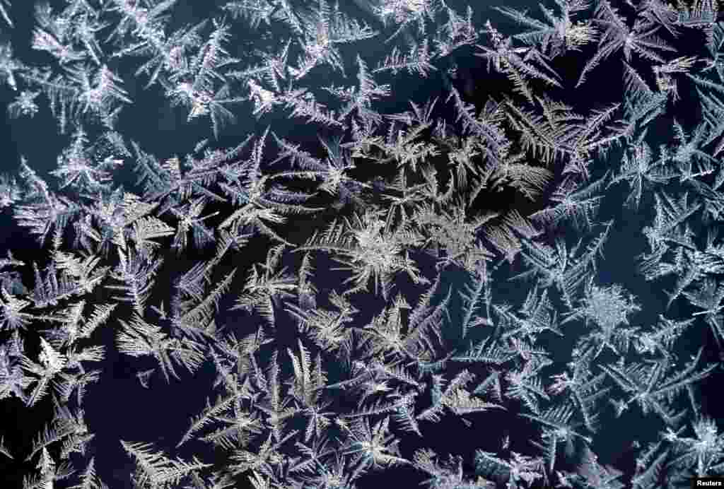 A window with frost pattern is pictured on top of the highest German mountain, the Zugspitze, in Garmisch-Partenkirchen, Germany February 28, 2018.