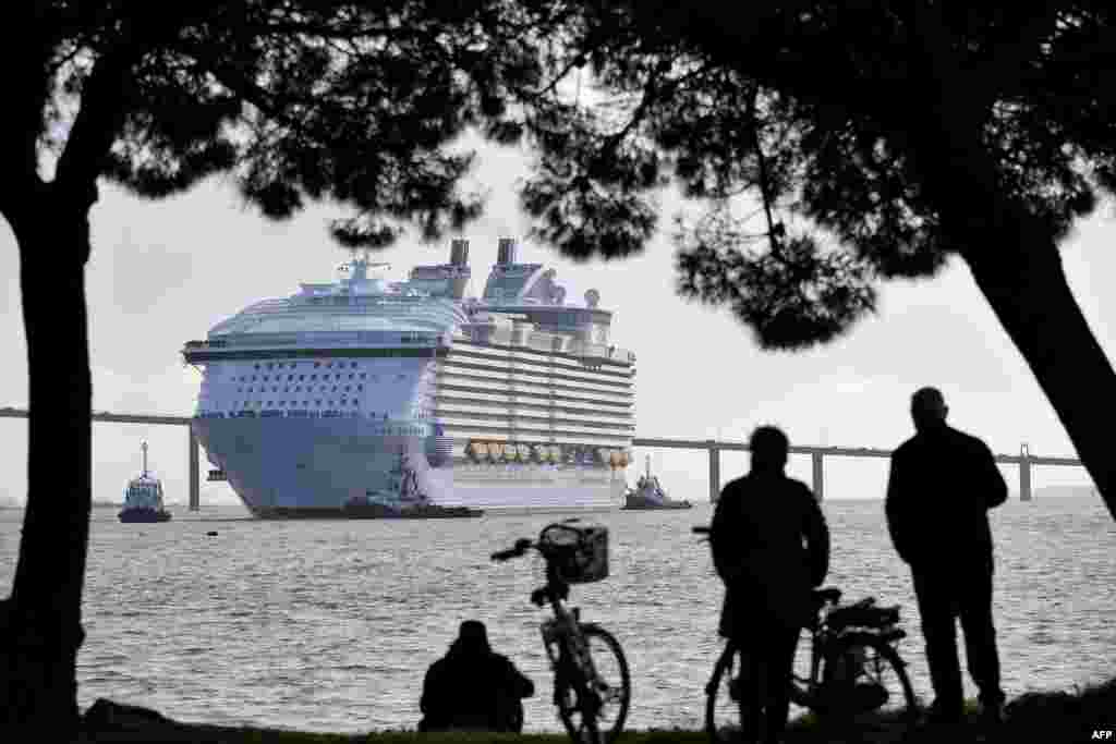 The U.S. company Royal Caribbean Cruise Limited (RCCL) tourism cruise liner 'Symphony of the Seas' leaves the shipyard of Saint-Nazaire, western France, March 24, 2018.