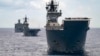 FILE - In this undated photo provided by the Australian Defense Force, Royal Australian Navy Ships Canberra, Supply and Warramunga sail in formation with 37 ships during Exercise Rim of the Pacific 2022.