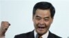 香港挺梁游行人士暴力攻击采访记者