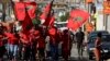 Members of the Economic Freedom Fighters (EFF) party make their way to attend a May Day rally in Alexandra Township, South Africa, May 1, 2019.