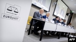 Прокурор МКС, єврокомісар з питань юстиції, президент "Євроюсту", генпрокурор України та заступник міністра юстиції США оголошують про розслідування злочинів агресії проти України. Фото: Koen van Weel/ANP/AFP