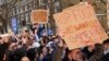 Football supporters demonstrate against the proposed European Super League outside of Stamford Bridge football stadium in London, April 20, 2021.