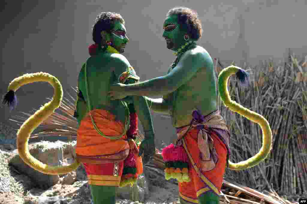 Indian artists dress up as the Hindu deity "Hanuman" -- the monkey God in Hindu mythology -- to mark the Rama Navami festival in Bangalore.